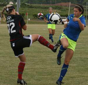 Elite girls club soccer players compete in a club soccer tournament.