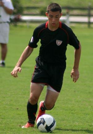 Elite boys club soccer player competes in a club soccer tournament.