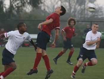 Elite club soccer players compete.