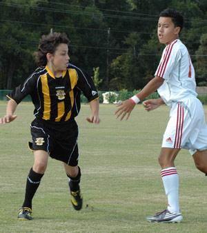 boy youth club soccer player