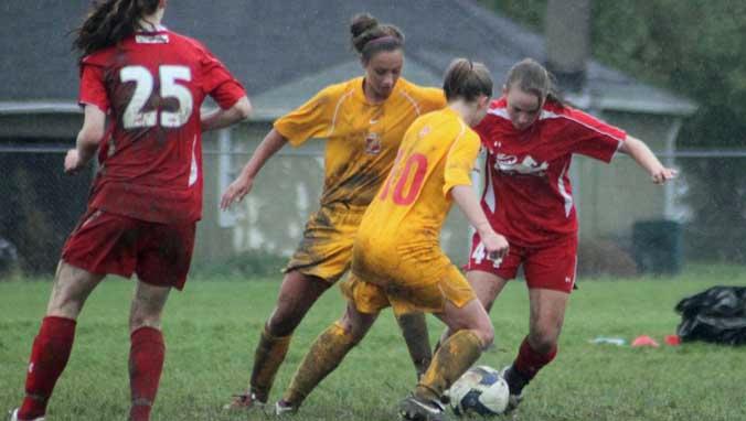 Teams show competitive spirit despite mud