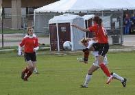 Eltie girls club soccer players compete in a cllub soccer tournament