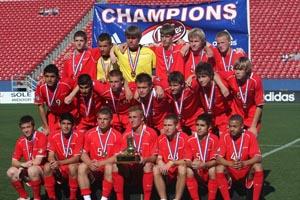 U18 Dallas Texans soccer club team pose after their victory.