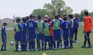 Club soccer player from Los Angles Futbol Club prepare for a match at Dallas Cup.