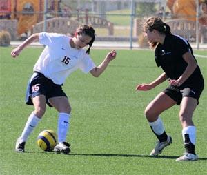 Elite club soccer players compete.